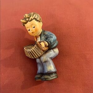 Charming Figurine with Accordion